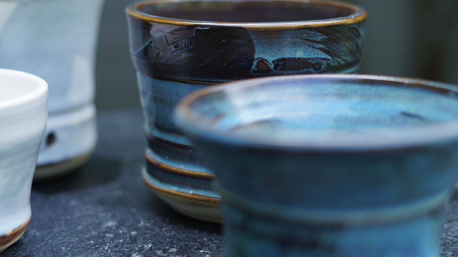 blue and white ceramic cups